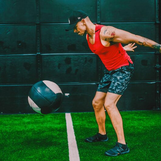 Man working out with medicine ball